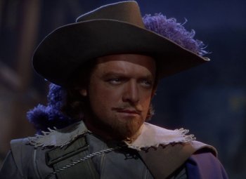 Movie still from “The Three Musketeers” (1948), directed by George Sidney – A person wearing a hat; Close Up shot, Low angle