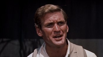 Movie still from “The Time Machine” (1960), directed by George Pal – A person wearing a jacket; Close Up shot, Low angle