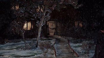 Movie still from “The Time Machine” (1960), directed by George Pal – A door that is open in the dark; Extreme Wide shot, High angle