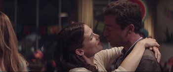 Movie still from “The Tribes of Palos Verdes” (2017), directed by Brendan Malloy – A man and a woman are kissing in a room; Close Up shot, Low angle