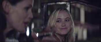 Movie still from “The Tribes of Palos Verdes” (2017), directed by Brendan Malloy – A woman sitting in front of a man holding a wine glass; Close Up shot, Over the shoulder angle