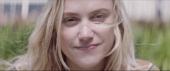 Movie still from “The Tribes of Palos Verdes” (2017), directed by Brendan Malloy – A woman's face with long blonde hair; Extreme Close Up shot, Overhead angle