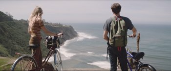Movie still from “The Tribes of Palos Verdes” (2017), directed by Brendan Malloy – A man standing on top of a cliff looking at the ocean; Medium shot, Low angle