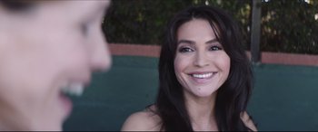 Movie still from “The Tribes of Palos Verdes” (2017), directed by Brendan Malloy – A person smiling at the camera; Close Up shot, Over the shoulder angle