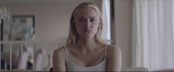 Movie still from “The Tribes of Palos Verdes” (2017), directed by Brendan Malloy – A woman with long blonde hair wearing a white tank top; Close Up shot, Over the shoulder angle
