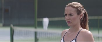 Movie still from “The Tribes of Palos Verdes” (2017), directed by Brendan Malloy – A female tennis player is standing on the court; Close Up shot, Over the shoulder angle