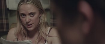 Movie still from “The Tribes of Palos Verdes” (2017), directed by Brendan Malloy – A woman with blonde long hair sitting in front of a mirror; Close Up shot, Over the shoulder angle