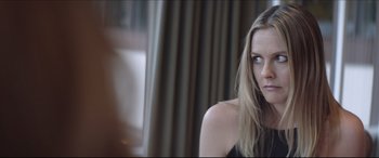 Movie still from “The Tribes of Palos Verdes” (2017), directed by Brendan Malloy – A beautiful young lady sitting in front of a window; Close Up shot, Over the shoulder angle