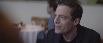 Movie still from “The Tribes of Palos Verdes” (2017), directed by Brendan Malloy – A person sitting in front of a table; Close Up shot, Over the shoulder angle