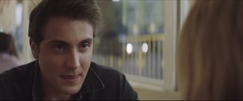 Movie still from “The Tribes of Palos Verdes” (2017), directed by Brendan Malloy – A young man's face in a room; Close Up shot, Over the shoulder angle