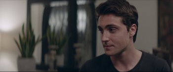 Movie still from “The Tribes of Palos Verdes” (2017), directed by Brendan Malloy – A person sitting in front of a window; Close Up shot, Over the shoulder angle