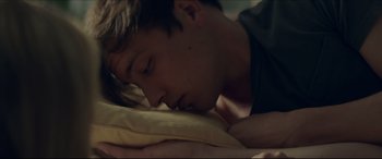 Movie still from “The Tribes of Palos Verdes” (2017), directed by Brendan Malloy – A young man sleeping on a pillow on top of a bed; Close Up shot, High angle