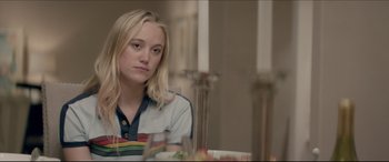 Movie still from “The Tribes of Palos Verdes” (2017), directed by Brendan Malloy – A woman sitting in front of a table with food on top of it; Close Up shot, Over the shoulder angle
