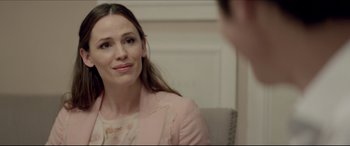 Movie still from “The Tribes of Palos Verdes” (2017), directed by Brendan Malloy – A woman sitting in front of a man in front of a mirror; Close Up shot, Over the shoulder angle