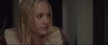 Movie still from “The Tribes of Palos Verdes” (2017), directed by Brendan Malloy – A woman with blonde hair sitting in a room; Close Up shot, Over the shoulder angle