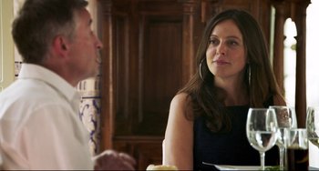 Movie still from “The Trip to Spain” (2017), directed by Michael Winterbottom – A man and a woman sitting at a dinner table; Medium shot, Over the shoulder angle