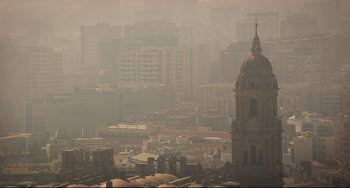 Movie still from “The Trip to Spain” (2017), directed by Michael Winterbottom – A view of a city from a high point of view; Extreme Wide shot, High angle