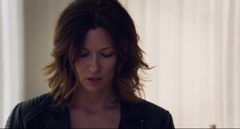 Movie still from “The Trip to Spain” (2017), directed by Michael Winterbottom – A person wearing a leather jacket; Close Up shot, Low angle