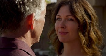 Movie still from “The Trip to Spain” (2017), directed by Michael Winterbottom – A man and a woman face to face in front of each other; Close Up shot, Over the shoulder angle