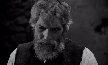An old man with a beard and a mustache