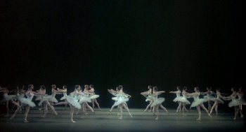 Movie still from “The Turning Point” (1977), directed by Herbert Ross – A group of young ballerinas performing on a stage; Extreme Wide shot, High angle