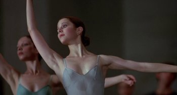 Movie still from “The Turning Point” (1977), directed by Herbert Ross – A woman that is doing a dance move; Close Up shot, Low angle