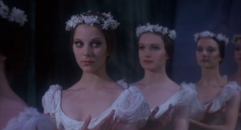 Movie still from “The Turning Point” (1977), directed by Herbert Ross – Two women in white dresses with flowers in their hair; Medium shot, Low angle
