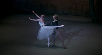 Movie still from “The Turning Point” (1977), directed by Herbert Ross – A man and a woman dancing on a stage; Wide shot, Low angle