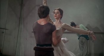 Movie still from “The Turning Point” (1977), directed by Herbert Ross – A painting of a woman dancing in front of a mirror; Medium shot, Low angle