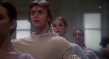 Movie still from “The Turning Point” (1977), directed by Herbert Ross – A group of young people standing in a room; Close Up shot, Low angle