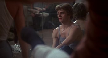 Movie still from “The Turning Point” (1977), directed by Herbert Ross – A man sitting in front of a bathroom mirror; Close Up shot, Low angle