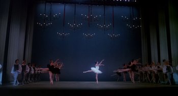 Movie still from “The Turning Point” (1977), directed by Herbert Ross – A group of ballerinas performing on a stage; Extreme Wide shot, High angle