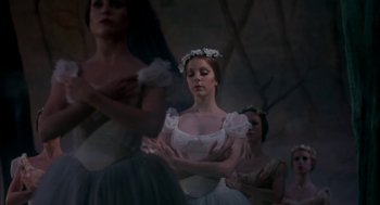 Movie still from “The Turning Point” (1977), directed by Herbert Ross – A group of young ballerinas in a dark room; Medium shot, Low angle