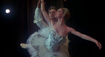 Movie still from “The Turning Point” (1977), directed by Herbert Ross – A man and a woman are performing a dance; Medium shot, Low angle