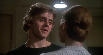 Movie still from “The Turning Point” (1977), directed by Herbert Ross – A man and a woman talking to each other; Close Up shot, Over the shoulder angle