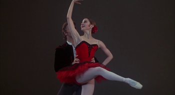 Movie still from “The Turning Point” (1977), directed by Herbert Ross – A man and a woman are performing a dance; Medium shot, Low angle