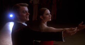 Movie still from “The Turning Point” (1977), directed by Herbert Ross – A man and a woman are dancing in a ballroom; Medium shot, Low angle