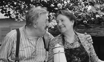 Movie still from “The Two of Us” (1967), directed by Claude Berri – An older man and a younger woman smiling at each other; Medium shot, High angle
