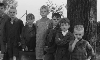 Movie still from “The Two of Us” (1967), directed by Claude Berri – A black and white photo of a group of young boys; Medium shot, High angle