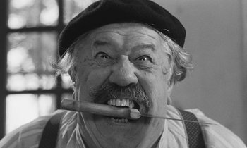 Movie still from “The Two of Us” (1967), directed by Claude Berri – An old man with a stick in his mouth; Close Up shot, Low angle