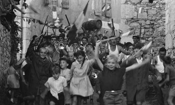 Movie still from “The Two of Us” (1967), directed by Claude Berri – A black and white photo of a group of people; Wide shot, High angle