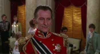 Movie still from “The Vampire Lovers” (1970), directed by Roy Ward Baker – A person wearing a uniform; Close Up shot, Over the shoulder angle