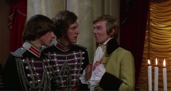 Movie still from “The Vampire Lovers” (1970), directed by Roy Ward Baker – A group of young men standing next to each other; Medium shot, High angle