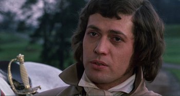 Movie still from “The Vampire Lovers” (1970), directed by Roy Ward Baker – A person with long hair; Close Up shot, Over the shoulder angle