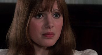 Movie still from “The Vampire Lovers” (1970), directed by Roy Ward Baker – A woman's face with green eyes; Close Up shot, High angle