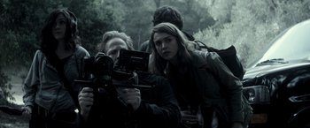 Movie still from “The Veil” (2016), directed by Phil Joanou – A man and a woman are filming a movie; Medium shot, Over the shoulder angle