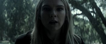 Movie still from “The Veil” (2016), directed by Phil Joanou – A person with long blonde hair; Close Up shot, Low angle