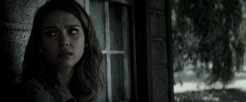 Movie still from “The Veil” (2016), directed by Phil Joanou – A person with long brown hair; Close Up shot, Over the shoulder angle