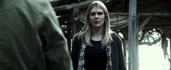 Movie still from “The Veil” (2016), directed by Phil Joanou – A woman standing in front of another person; Close Up shot, Over the shoulder angle