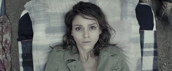 Movie still from “The Veil” (2016), directed by Phil Joanou – A person laying on a bed; Close Up shot, Overhead angle